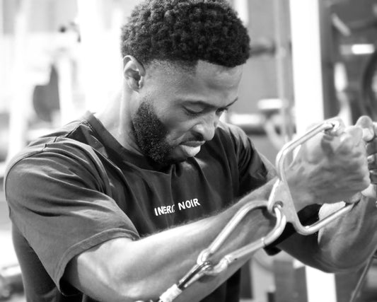 Inherit Noir Featherweight Performance T-Shirt in Black. Flat-lay product detail.