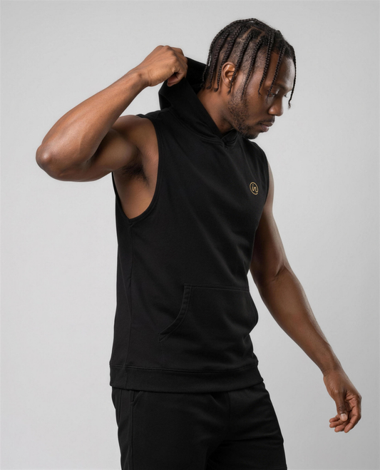 IN Sleeveless Hoodie Black — studio 3/4 action on-model