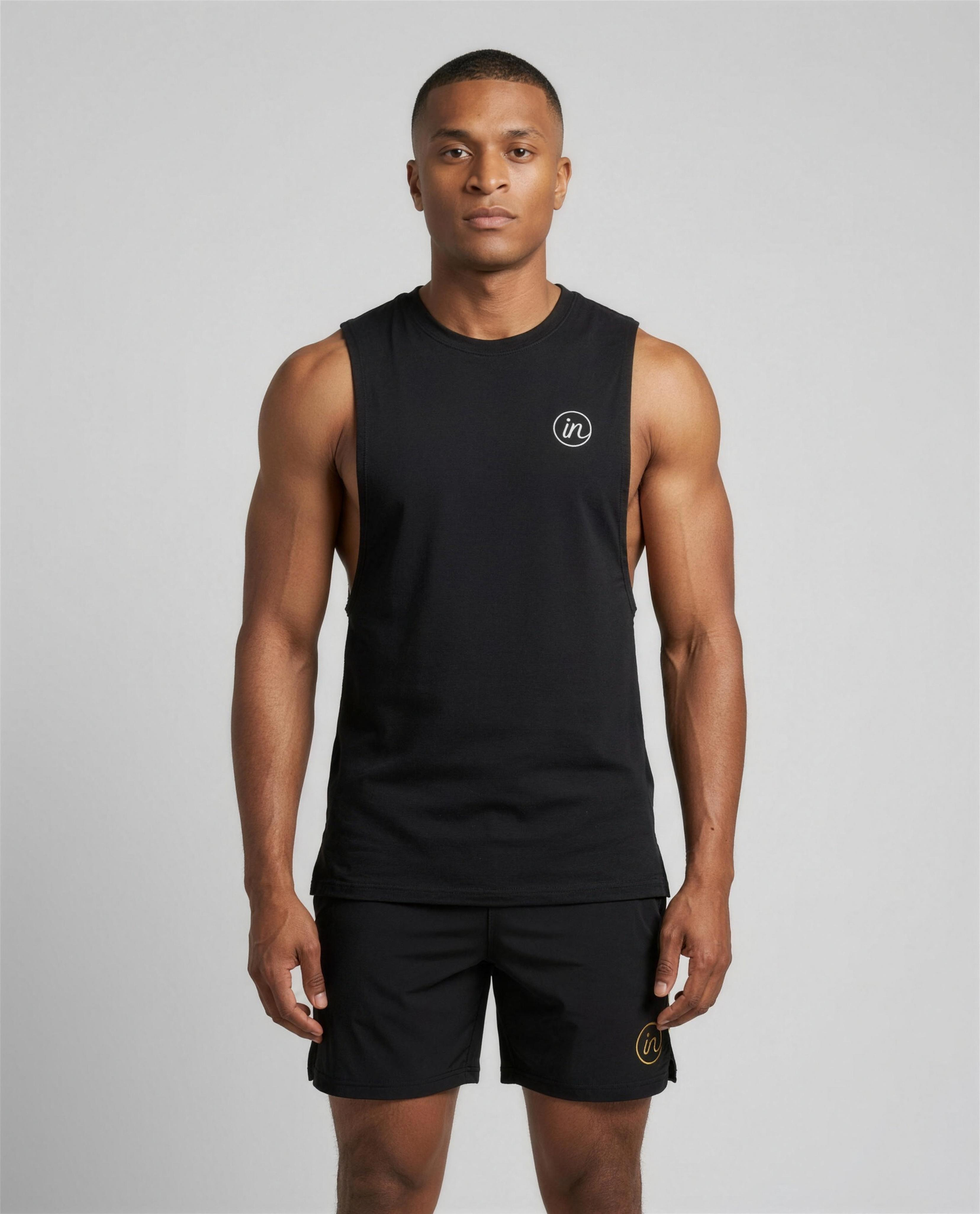 IN Motion Tank Black — studio front on-model